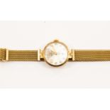 A ladies Zenith 9ct gold bracelet watch, round champagne dial, diameter approx 20mm, numbers,