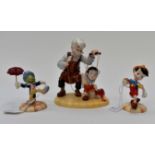 Disneys Pinocchio collection by Royal Doulton entitled "Showcase collection" x 3 figurines/statues