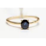 A sapphire solitaire, the oval sapphire weight approx 0.