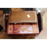 A stained and carved wood jewellery box;