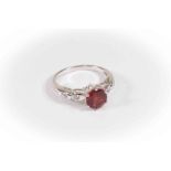 A stone set dress ring in 9ct white gold,