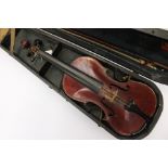 A violin in wooden case with bow,
