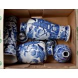 Pair of Chinese blue and white Oriental decorated vases and covers, A/F, 34 cms tall approx,