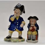 A 19th Century pottery Toby Jug with cover and another (2)