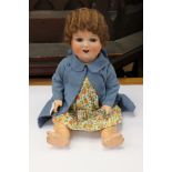 An Armand Marseille porcelain head doll with 1920's perm ("Marcel wave" hair) number 996, number 9,