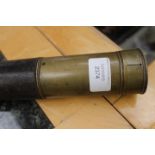 A two draw brass Telescope by "Ross, London". Black leather covered body.