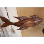 A Pitcairn Island carving of a flying fish, in hardwood,