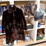 A full length dark brown lamb coat early 1950's,