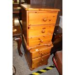 A pair of pine three drawer bedside chests (2)