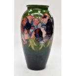 A Moorcroft Anemone vase, green and blue merging,