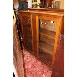 A 1950's mahogany display cabinet.