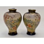 A pair of Meiji period Japanese Satsuma vases, with navy blue ground and gilded signed to bases,
