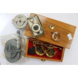 A collection of assorted curios to include: scales, day/night scale,