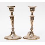A pair of silver candlesticks Elkington and Co Sheffield 1898,