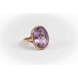 An amethyst dress ring, the large single stone amethyst approx 17mm x 12mm,
