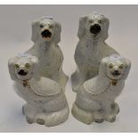 Two pairs of Victorian Staffordshire Spaniel figures (4)