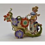 A German mantle Cornucopia vase circa 1920's with woman playing lute
