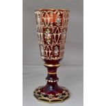 A 19th Century Bohemian chalice style vase, rim has firing chip with original over paint,