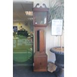 A George III oak and mahogany cross-banded 30 hour longcase clock, with a white enamelled dial,