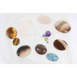 Six polished agates, tigers eye,