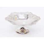 A silver pedestal bonbon dish with stylised floral and scroll pierced design, Sheffield 1938,