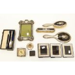 A collection of silver to include tortoiseshell dressing set, including brushes and mirror, London,