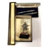 An English miniature pewter figure of "SAS Who Dares Wins" together with 1960's Canadian boxed pens,