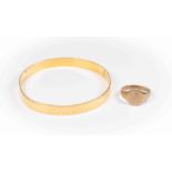 ***AUCTIONEER TO ANNOUNCE BANGLE IS 24CT***A gold bangle, diamond cut texture,