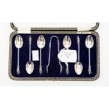 A cased set of silver apostle spoons and sugar nips, Sheffield,