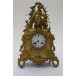 A late 19th century gilt metal, eight day mantle clock, in the Rococo revival style,