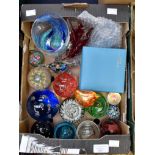 A collection of paperweights including Millefiori versions along with other glass versions,