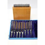 Two boxes of assorted tuning forks,
