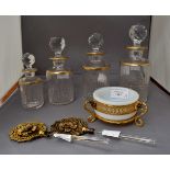 A set of four graduated French gold topped perfume bottles,