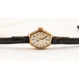 A Caravelle 9ct gold ladies watch,