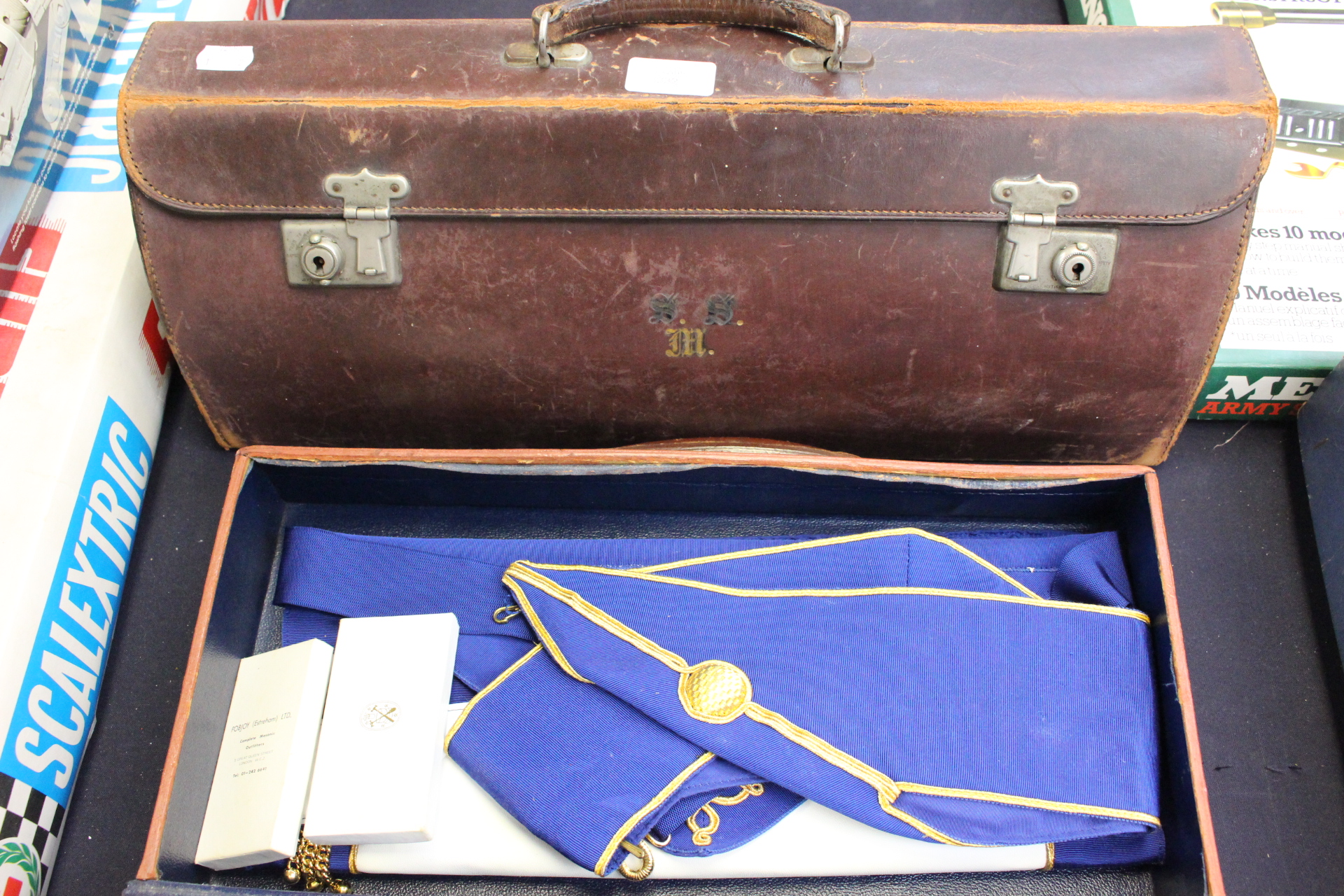 Masonic Interest: Two cased sashes with cuffs and bibs and base medals,