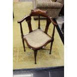 An Edwardian inlaid mahogany corner chair,