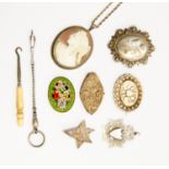 A collection of silver and white metal jewellery to include two Victorian mourning brooches,