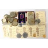 A bag of coins includes 1927 brief crown,