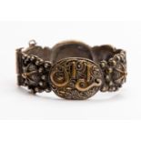 A turn of the Century unmarked decorative bangle, middle eastern,