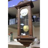 An early 20th Century oak Vienna wall clock, eight day,