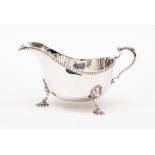 An Elizabeth II large silver sauce boat, Birmingham 1956,