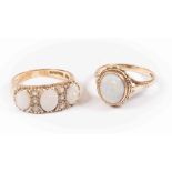 Two opal set 9ct gold dress rings, comprising a three stone opal ring set with white stone accents,