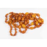 Art Deco butterscotch amber, graduated barrel and oval shape beaded necklace, opera length,