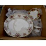 Royal Albert 1962 Country Roses 24 piece tea set and six Cottage Garden serving dishes (30)