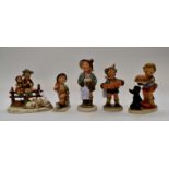 Five Hummel children figures to include; Eventide; Merry Wander;