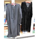 A black wool Dorville late 1950's dress with jacket.