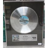 Bloody Tourists silver framed, certified platinum LP, Record Sales Award, presented to Ric Dixon,