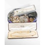 Quantity lot of costume jewellery; beads, faux pearls, stone set brooches, gold plated necklaces,