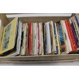 One hundred and ten plus 7 inch singles, The Beatles, The Who, Rolling Stones, Numan,