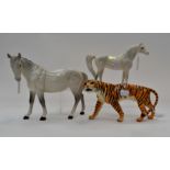 Two grey Beswick horses along with a Beswick tiger.